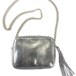 Victoria's Secret Silver Crossbody Bag with gold chain strap.